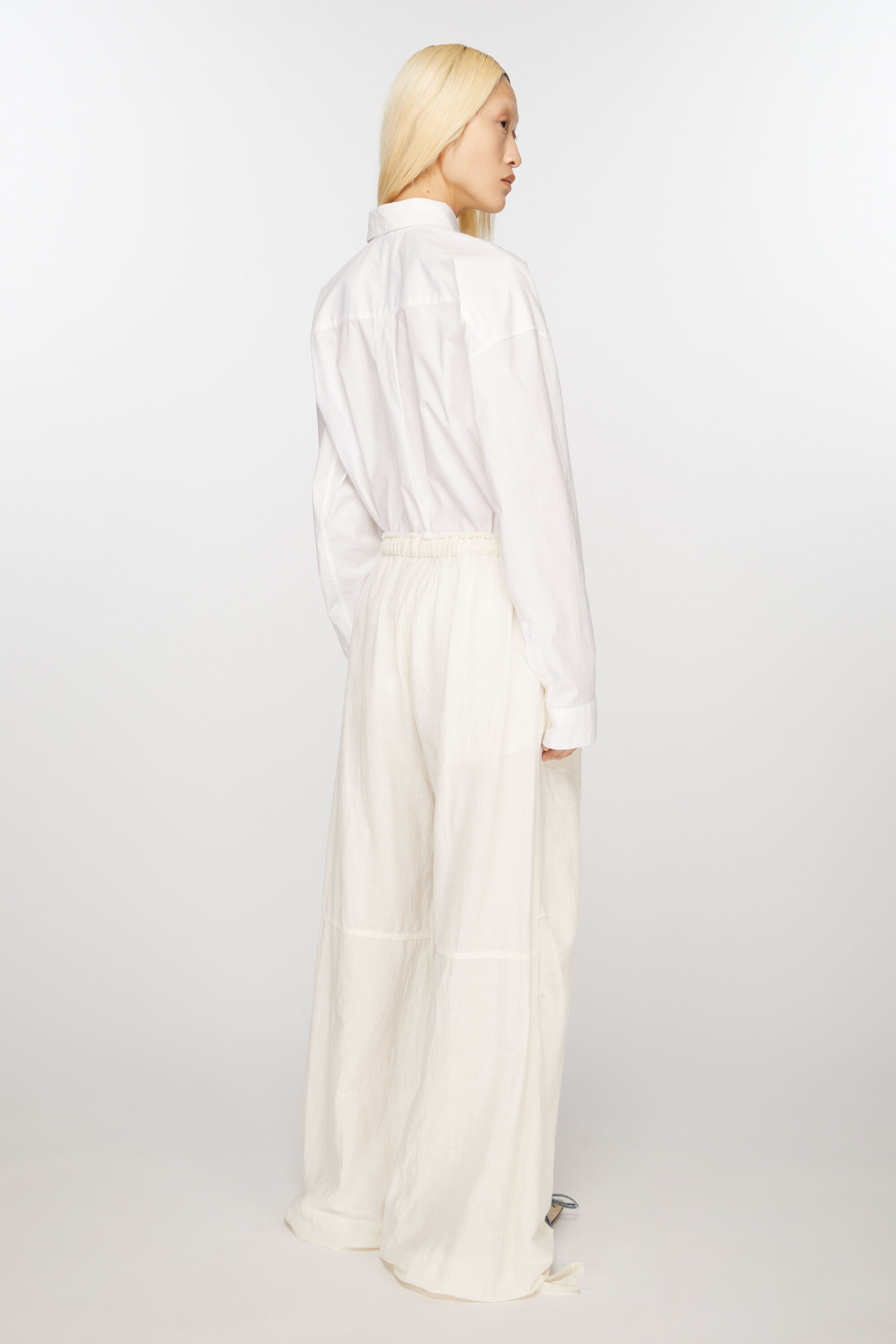 Shop Acne Studios Wide-leg Trousers In White