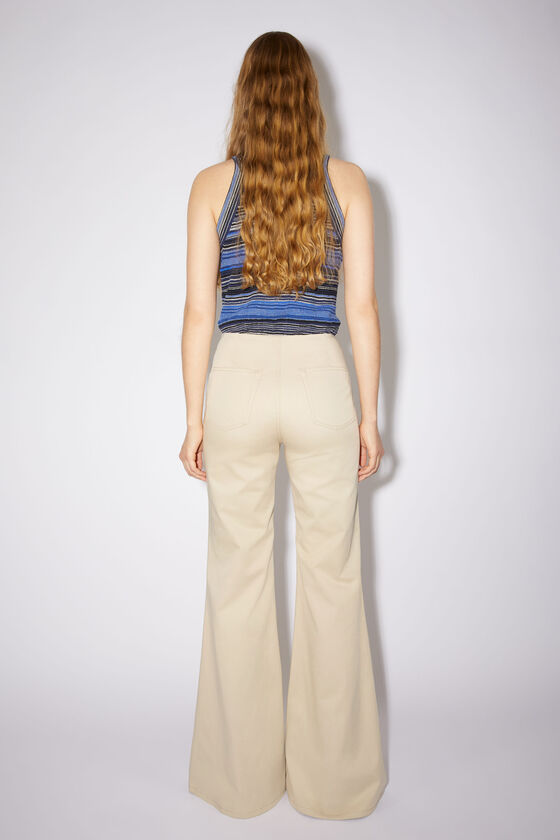 Acne Studios Flared Stretch-cotton Trousers In Nude