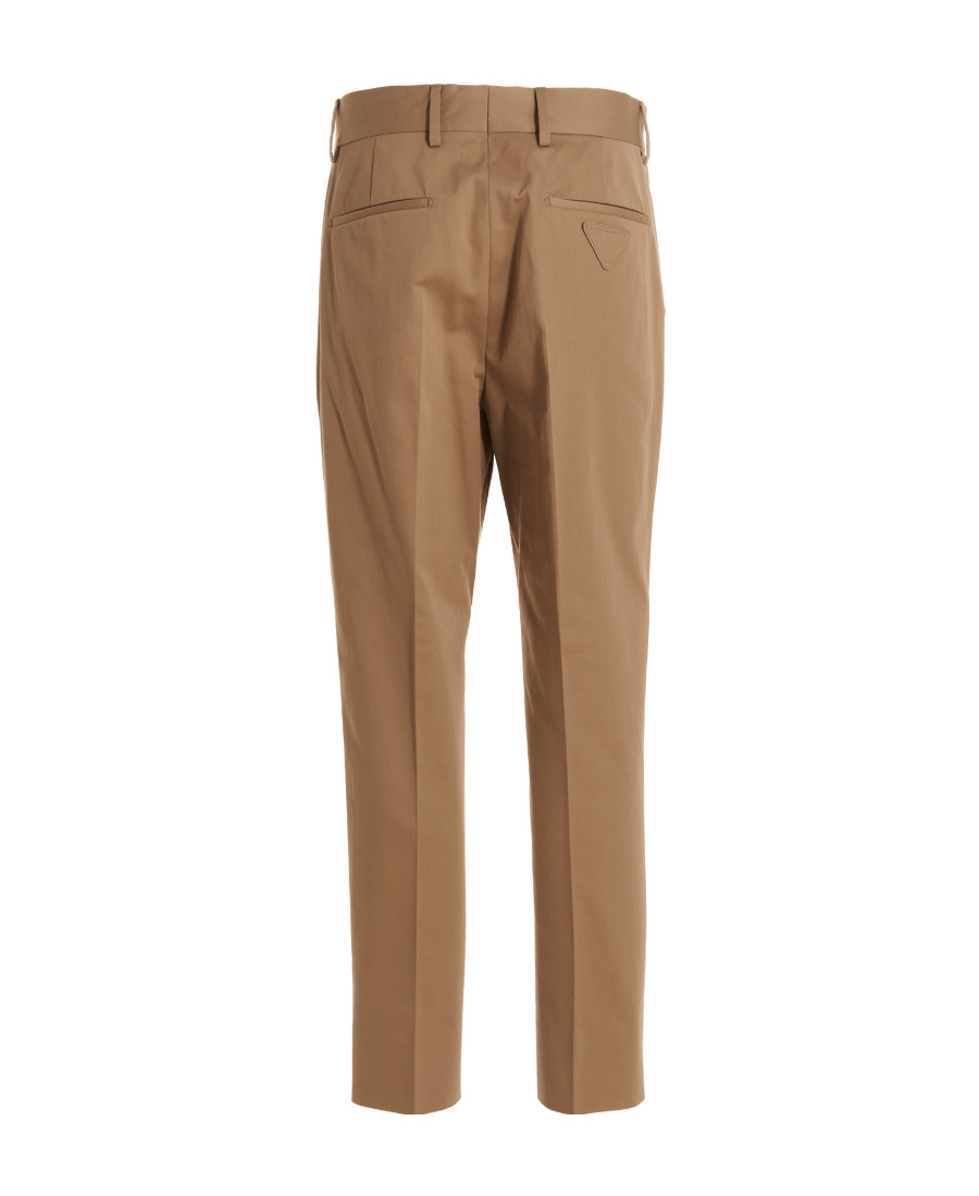 Prada Rear Logo-patch Detail Trousers In Brown