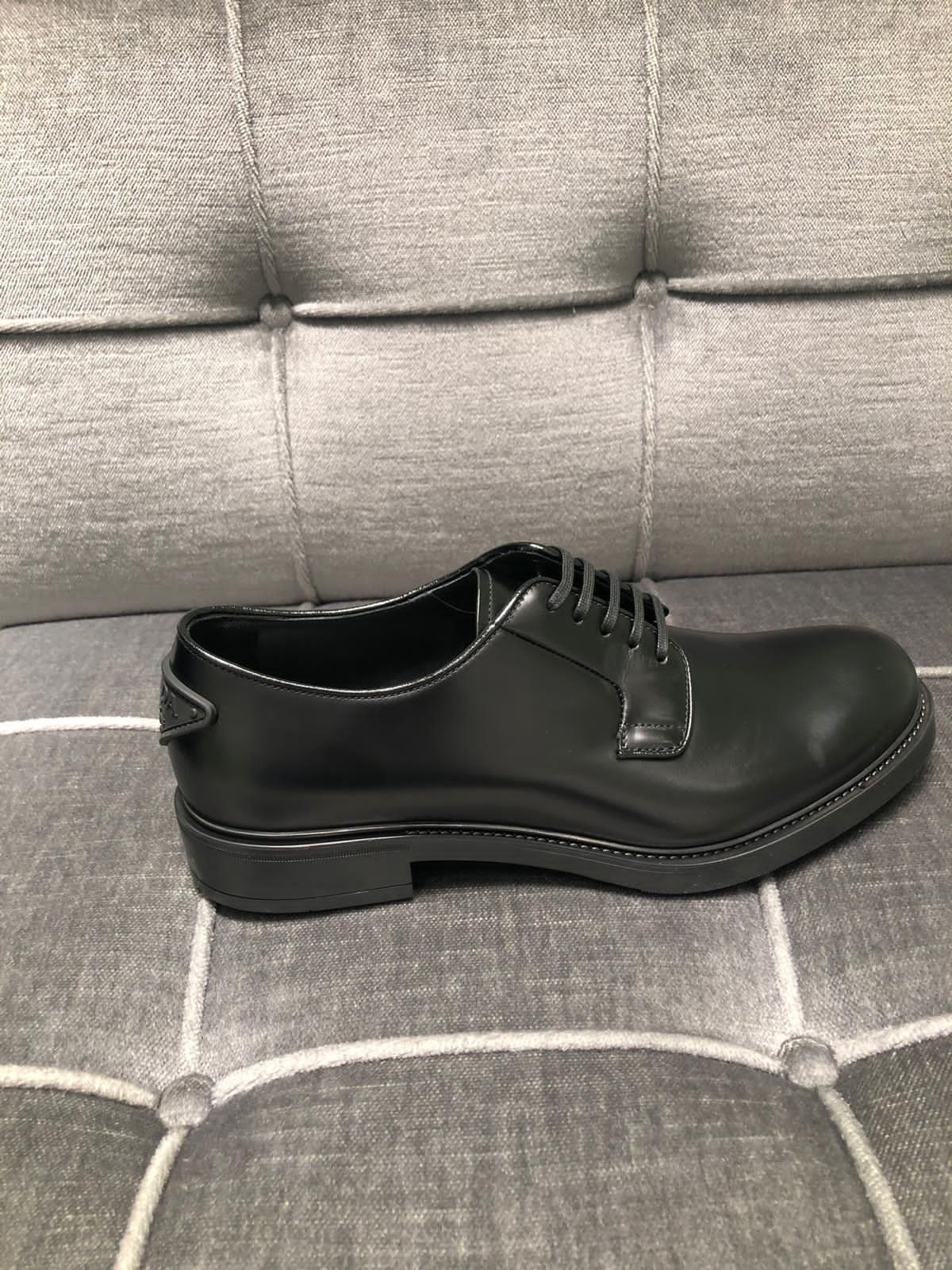Prada Lace-up Leather Derbies In Black