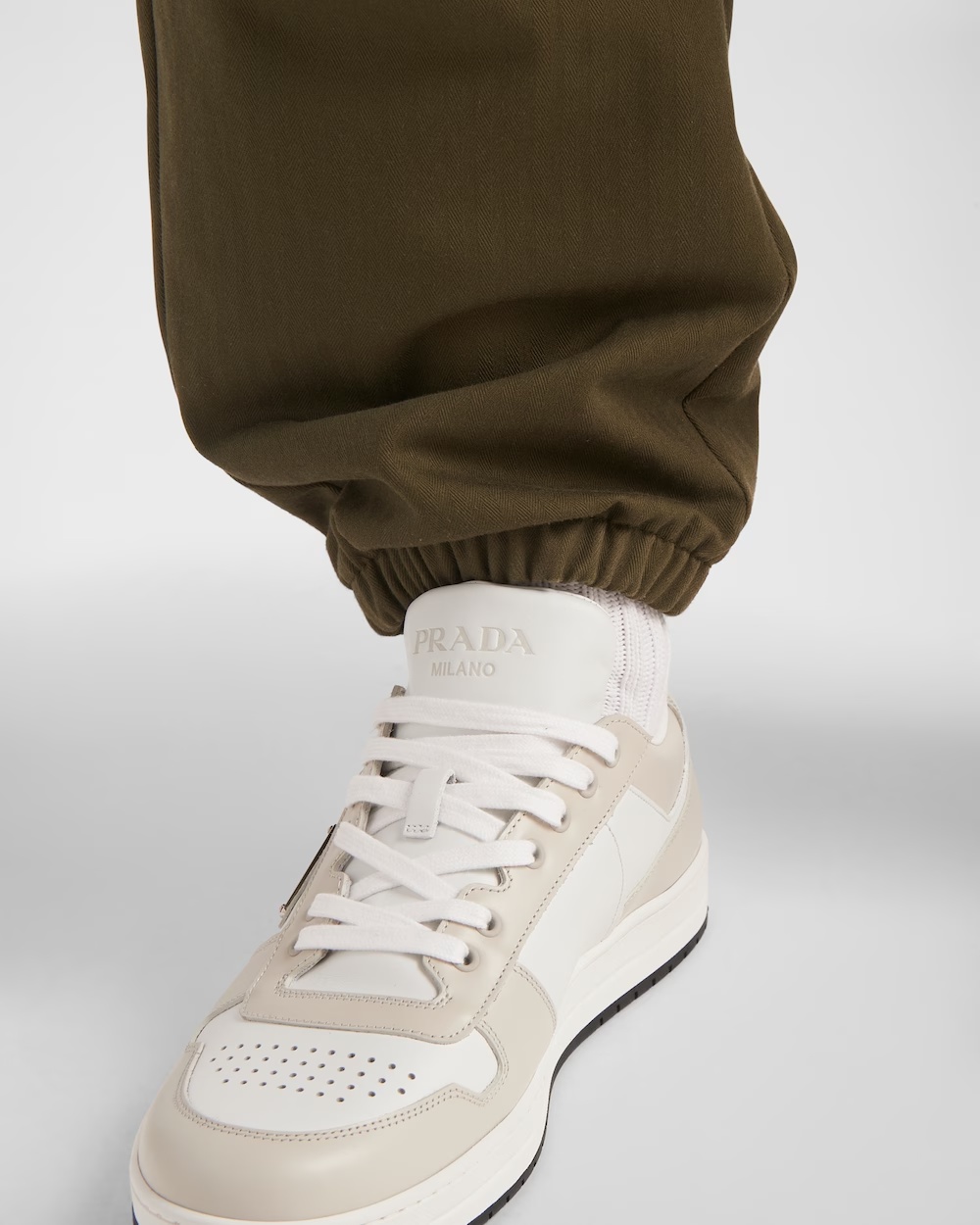 Prada Downtown Logo-plaque Perforated Leather Low-top Trainers In White