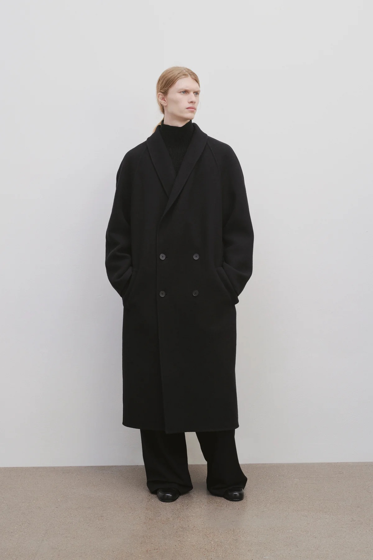 The Row Double-breasted Wool Coat In Black