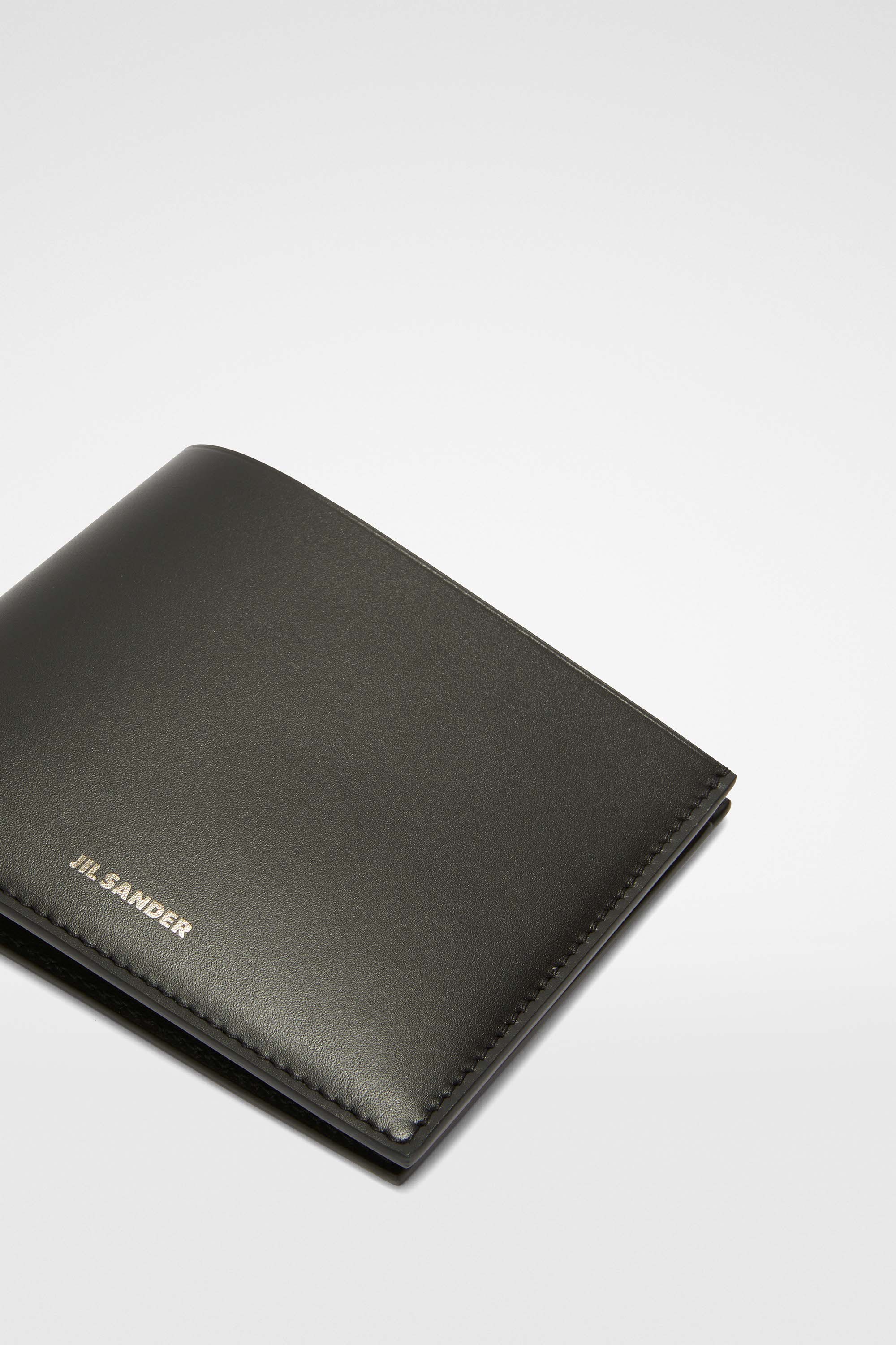 Jil Sander Logo Detailed Bi-fold Wallet In Black