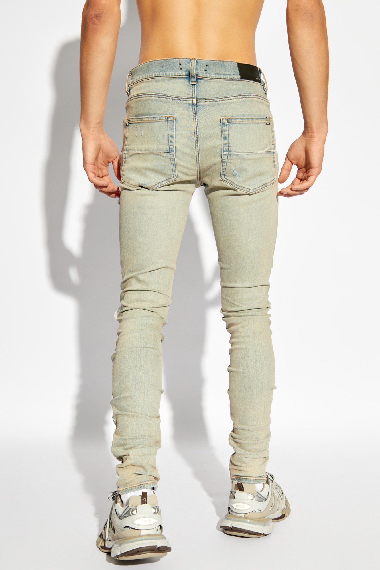 Amiri Mx1 Slim Fit Jeans With Distressed Red Accents In Gray