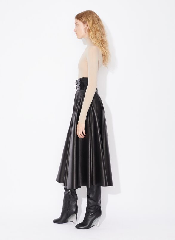Alaïa Long-sleeved Jumpsuit In Nude