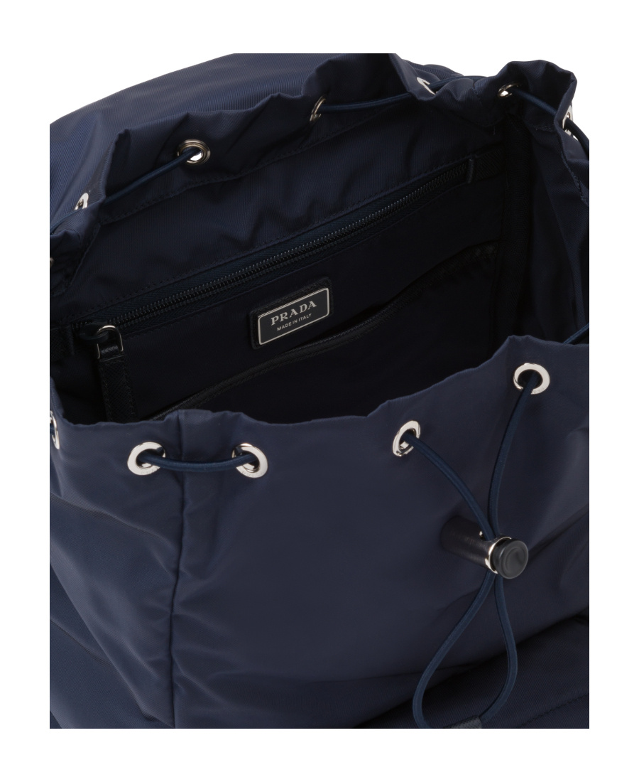 Prada Structured Leather Backpack With Logo Zipper Closure In Blue
