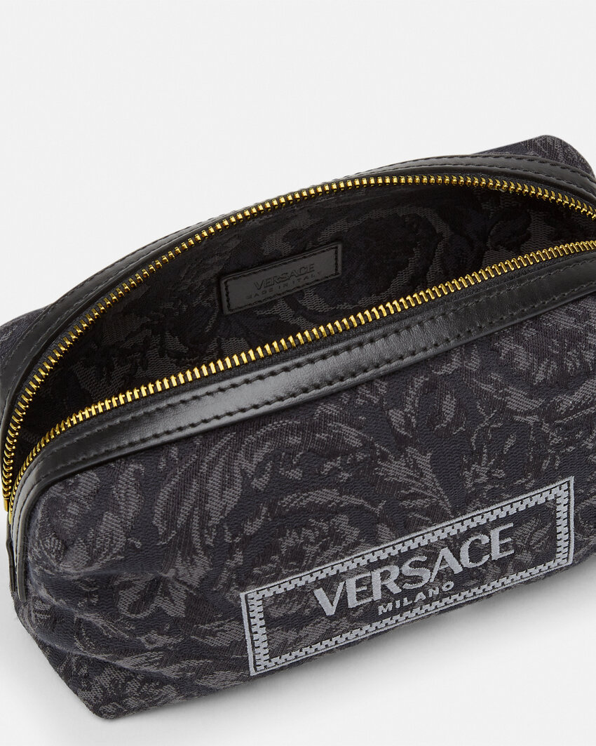 Versace Logo-embroidered Jacquard Zip-up Toiletry Bag In Black