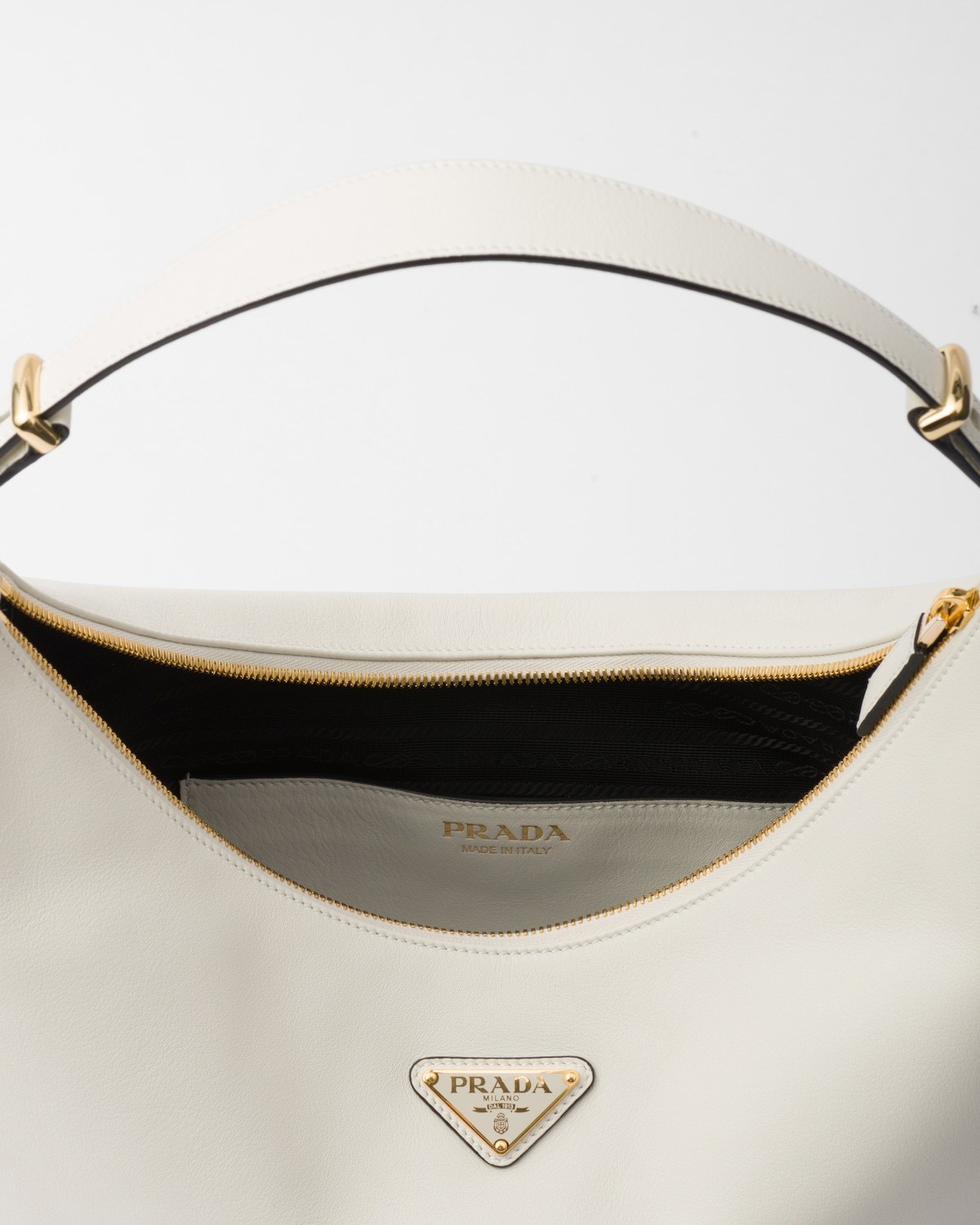 Prada Large Arqué Leather Shoulder Bag In White