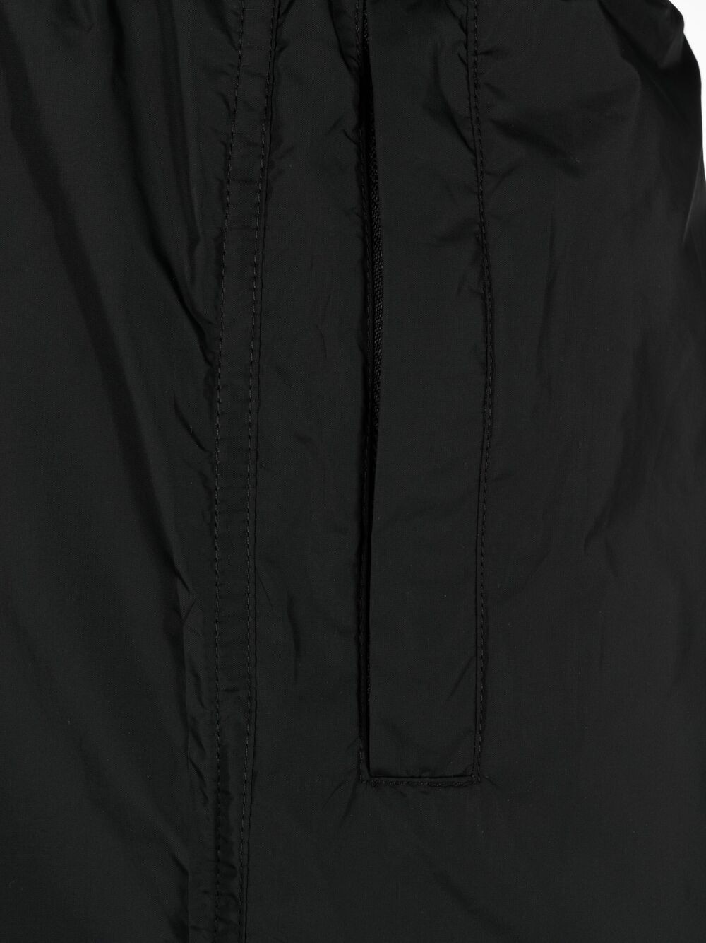 Our Legacy Elastic Waistband Swim Shorts With Side Pockets In Black