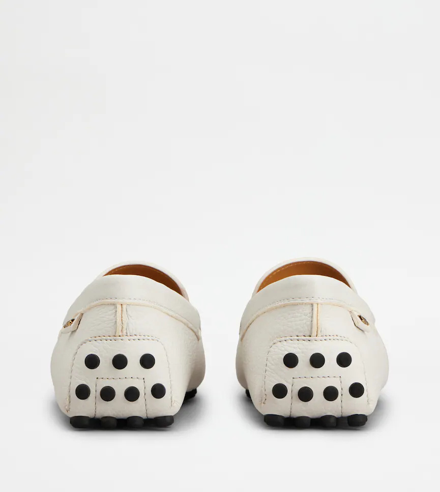 Tod's Gommino Embossed Slip-on Loafers In White