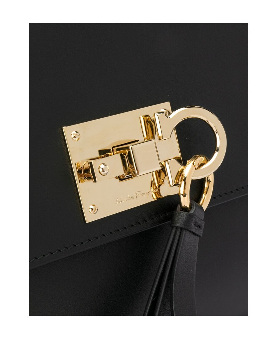 Shop Ferragamo Vara Turn-on Cross-body Bag In Black