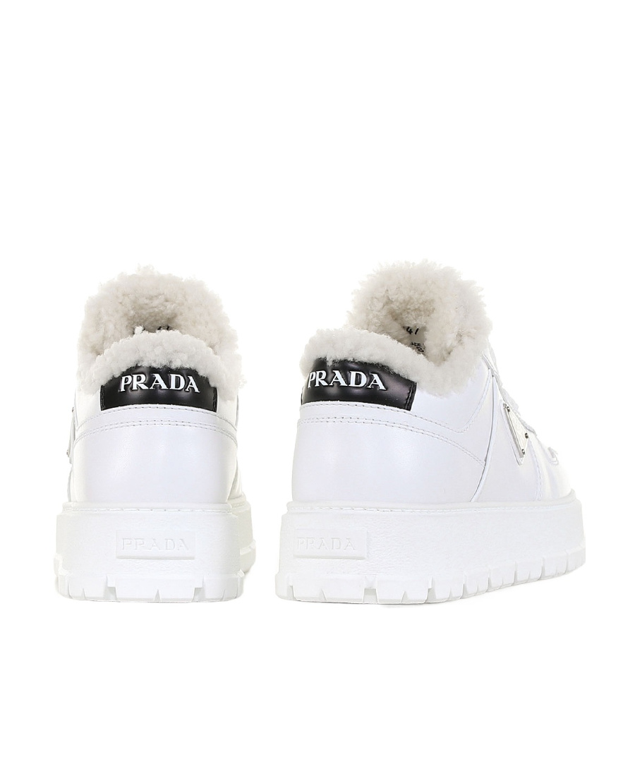 Prada Leather Shearling Lug-sole Sneakers In White