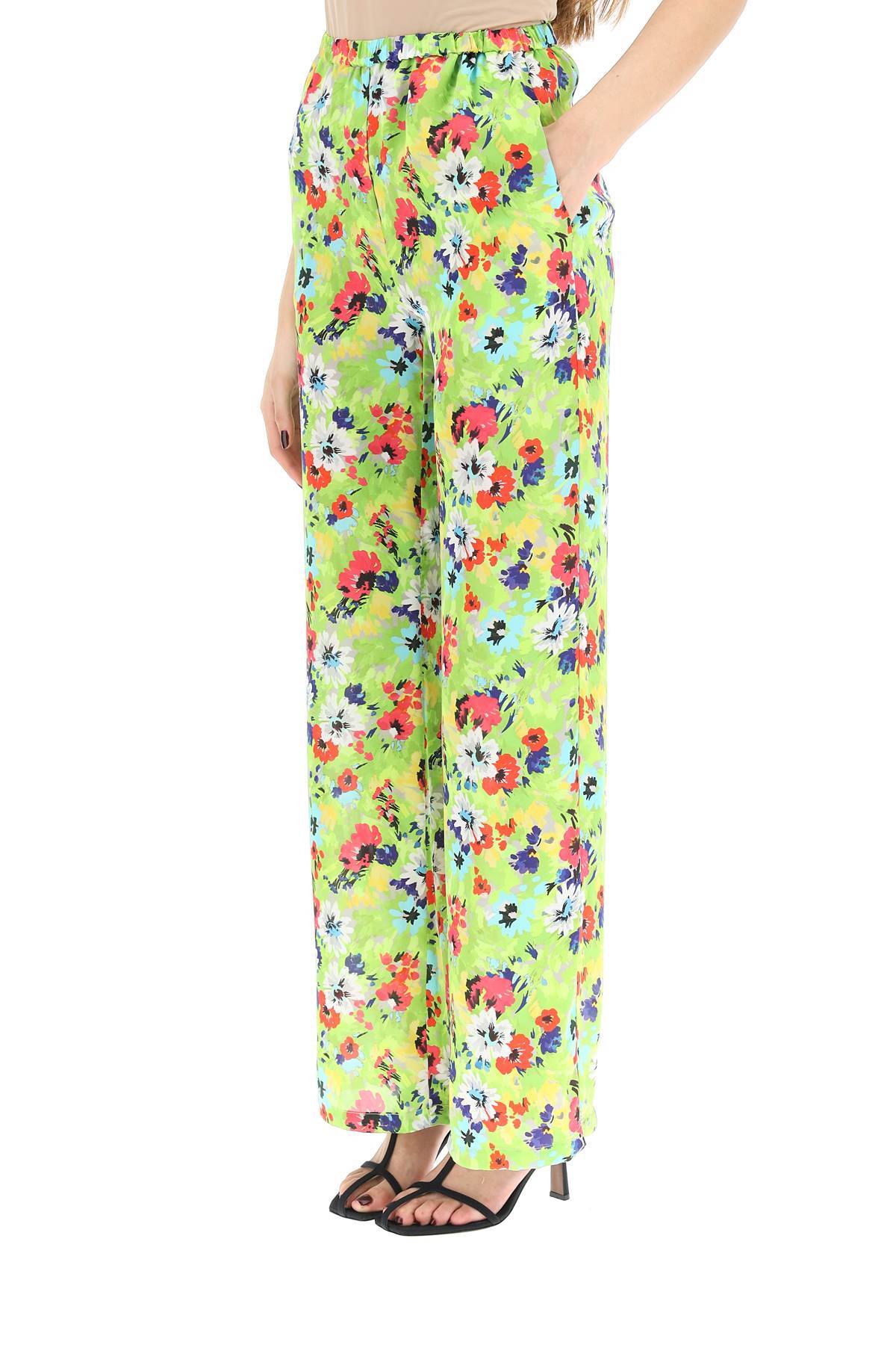 Shop Msgm Floral Printed Wide Leg Pants In Green
