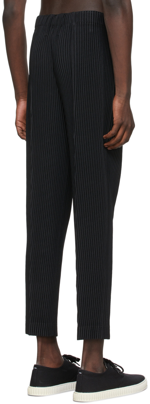 Issey Miyake Tapered Plisse Trousers In Black