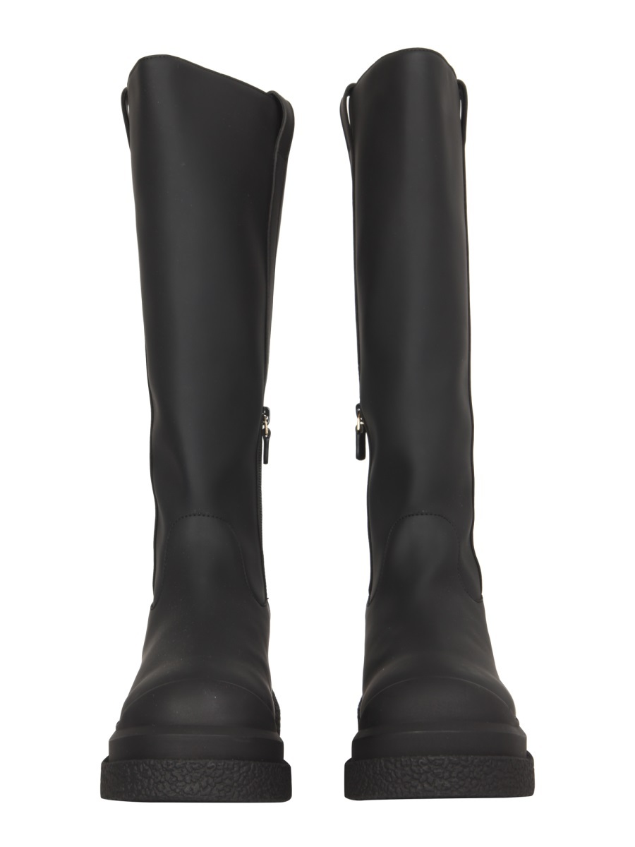 STUART WEITZMAN SPLICING DESIGN AND KNEE BOOTS