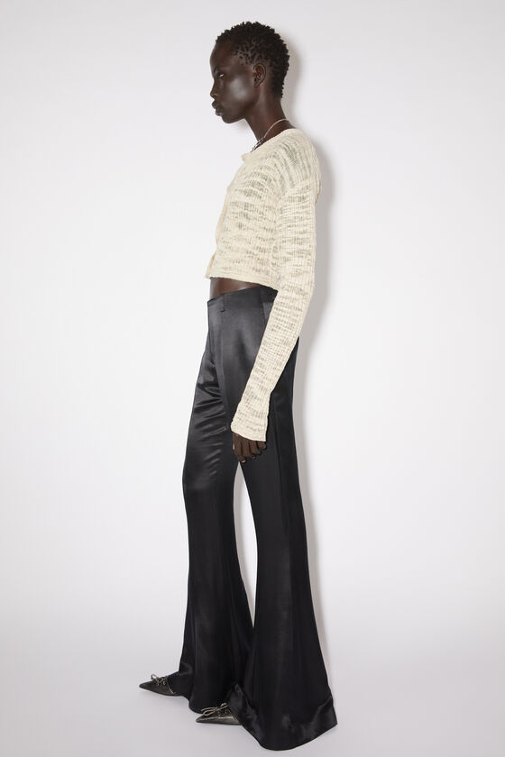 Acne Studios Low-rise Flared Trousers In Black