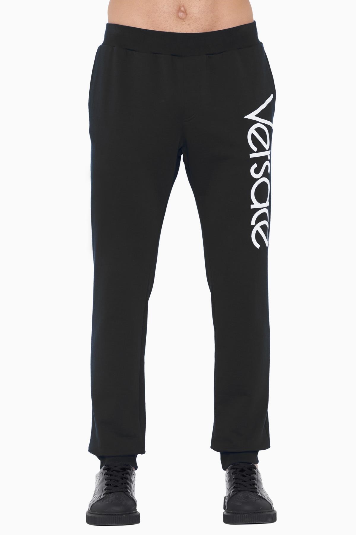 Versace Logo Sports Leg Retractor Pants In Black