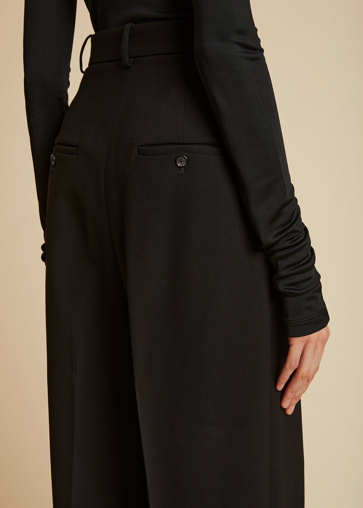 Khaite Cessie Pleated High-waisted Trousers In Black
