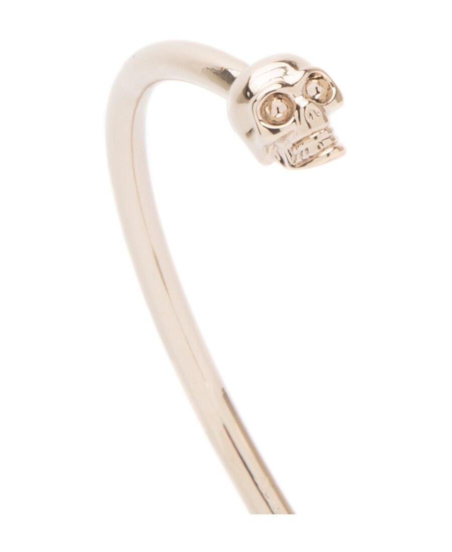 Alexander Mcqueen Twin Skull Bracelet In Yellow