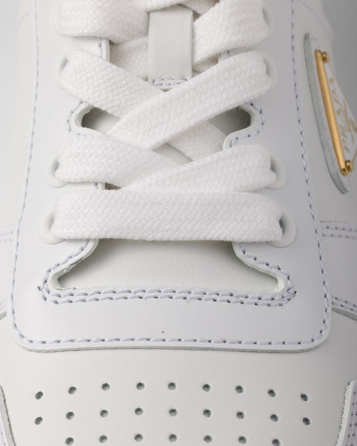Prada Laced Sneakers In White