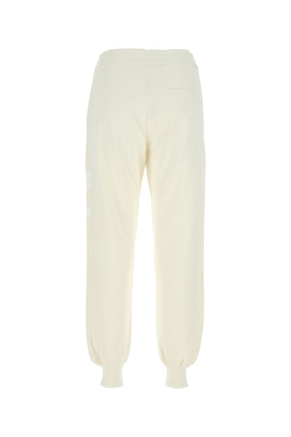 Alexander Mcqueen Graffiti Print Cotton Joggers In Nude