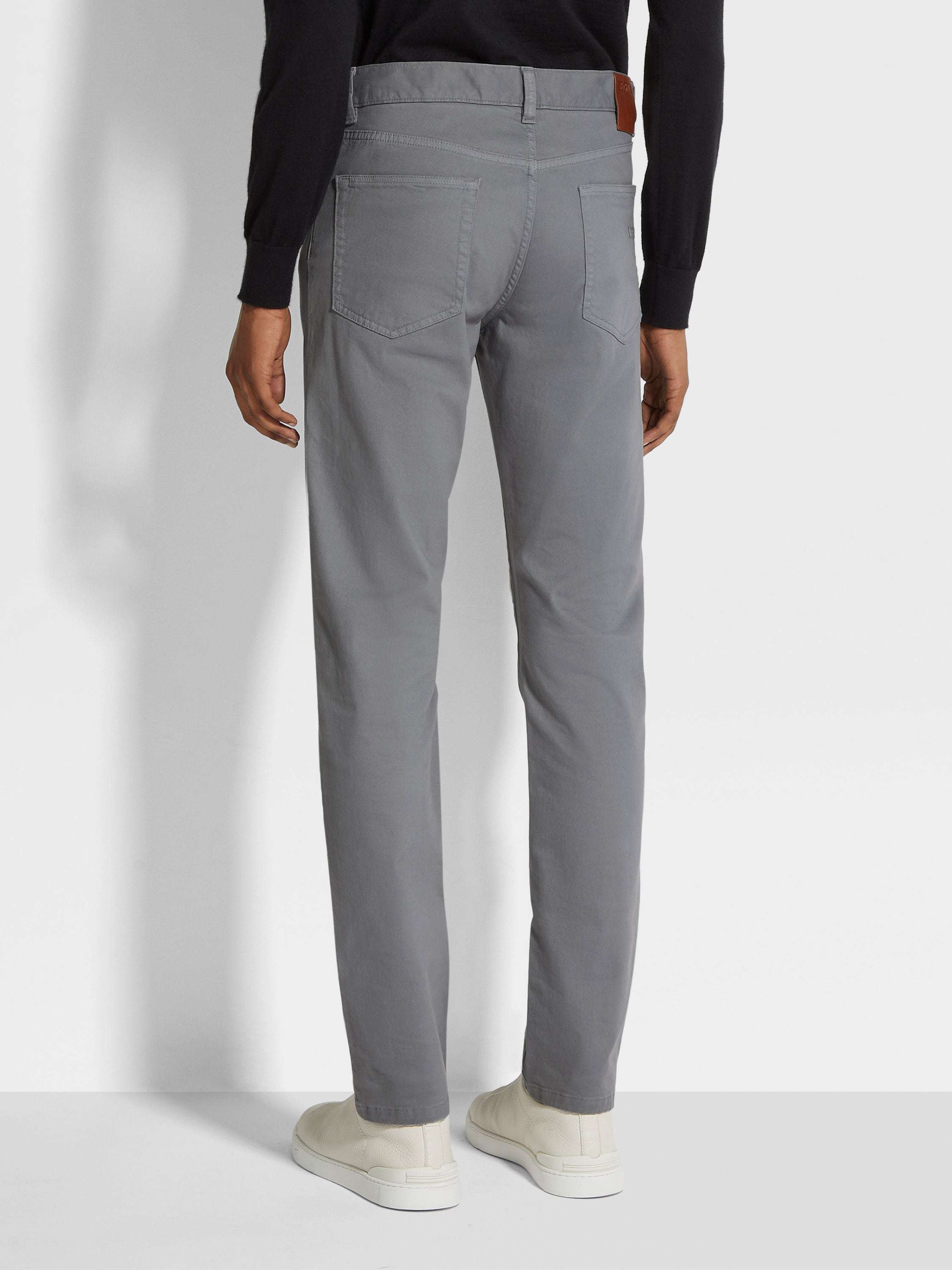 Shop Zegna Garment-dyed Tapered Jeans In Gray