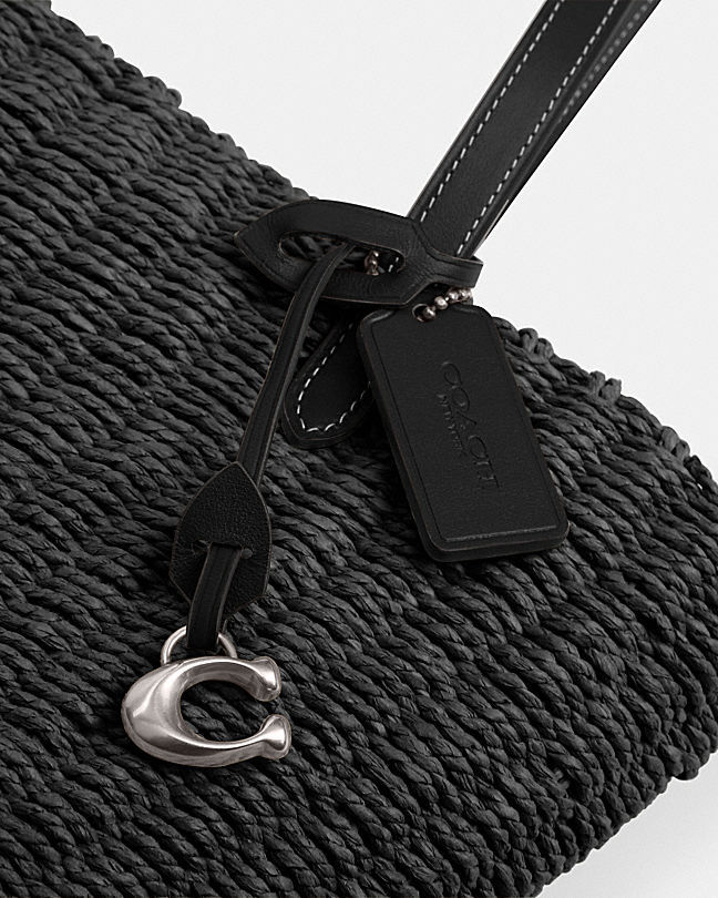 Shop Coach Small Straw Tote Bag In Black