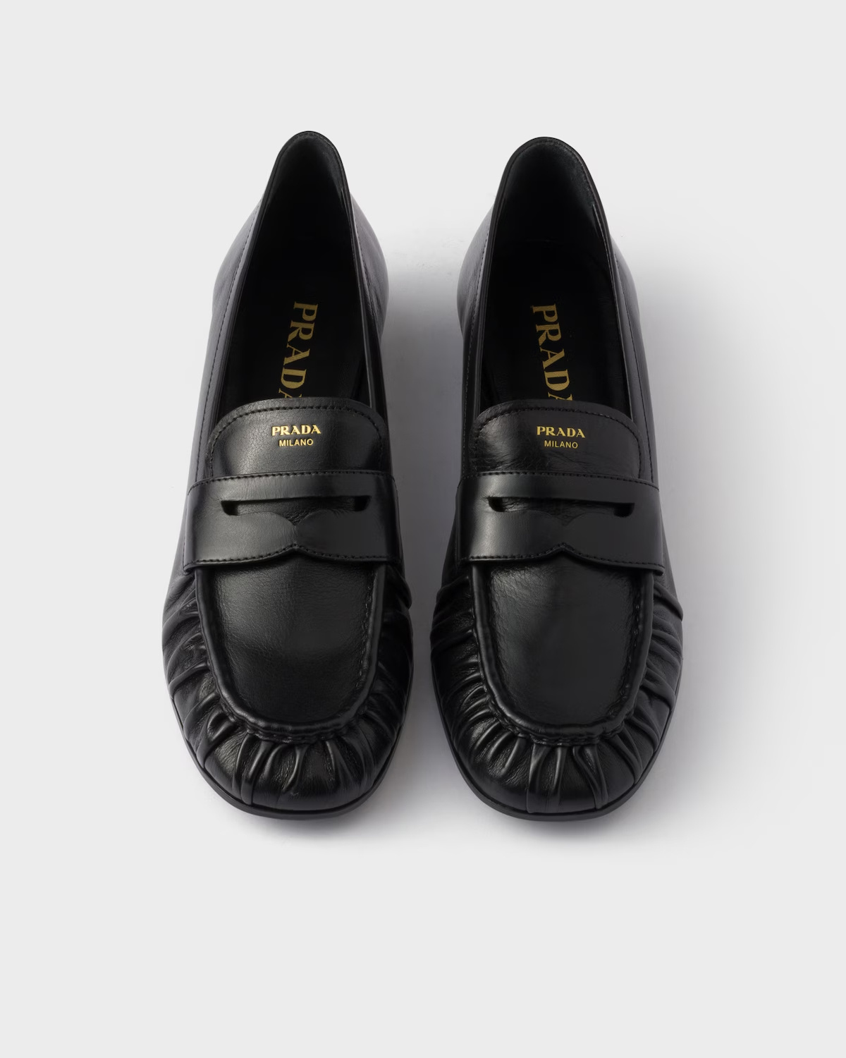 Prada Round-toe Loafers In Black