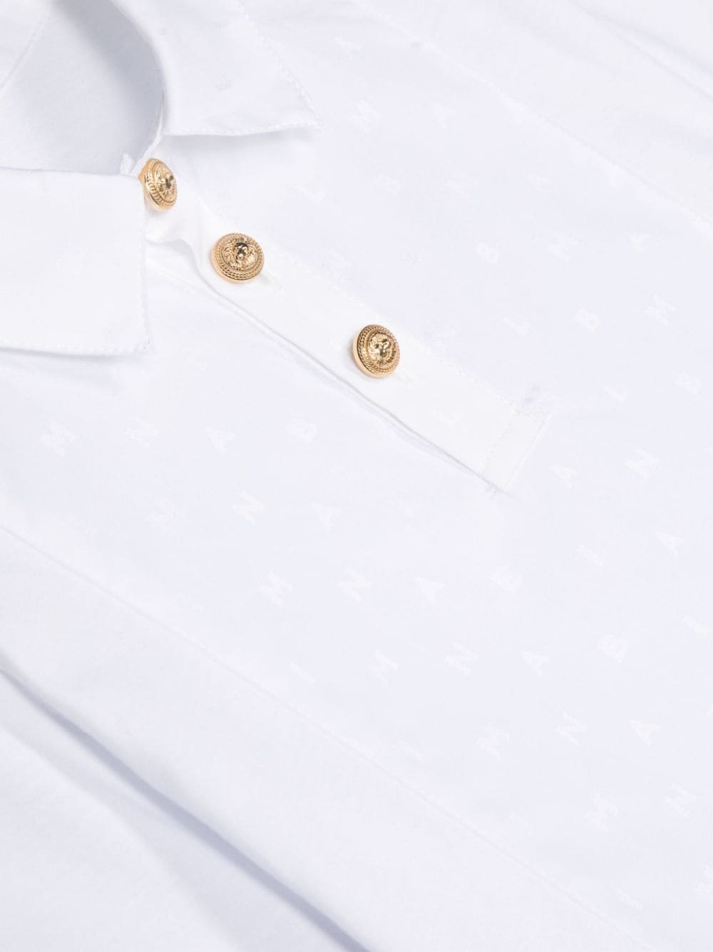 BALMAIN LOGO-JACQUARD POLO SHIRT