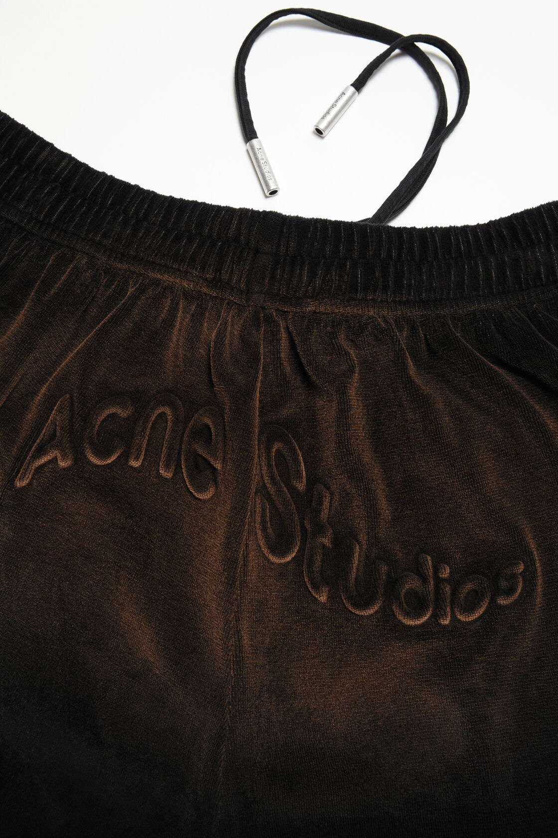 Acne Studios Logo-embossed Velvet Trousers In Black