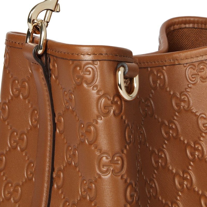 Gucci Gg Emblem Small Bucket Bag In Brown