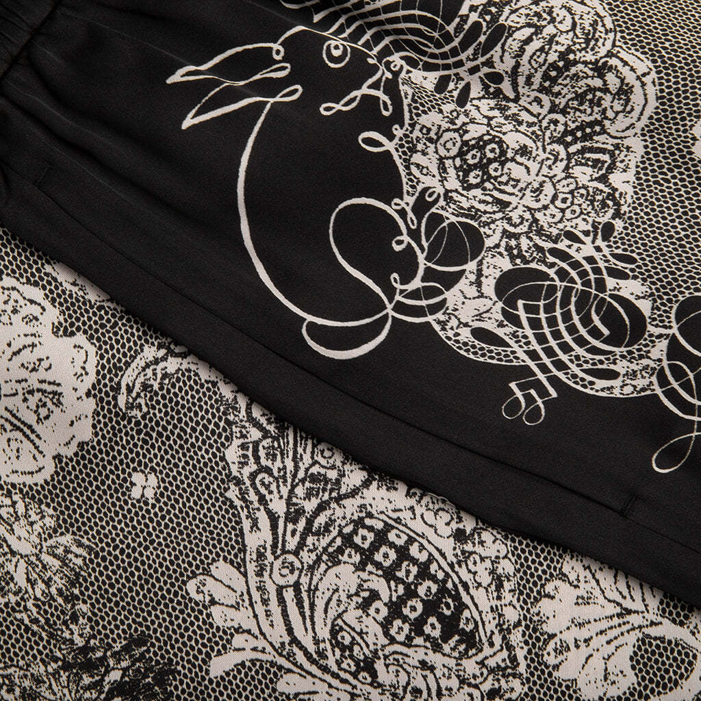 Shop Acne Studios Floral-print Track Shorts In Black