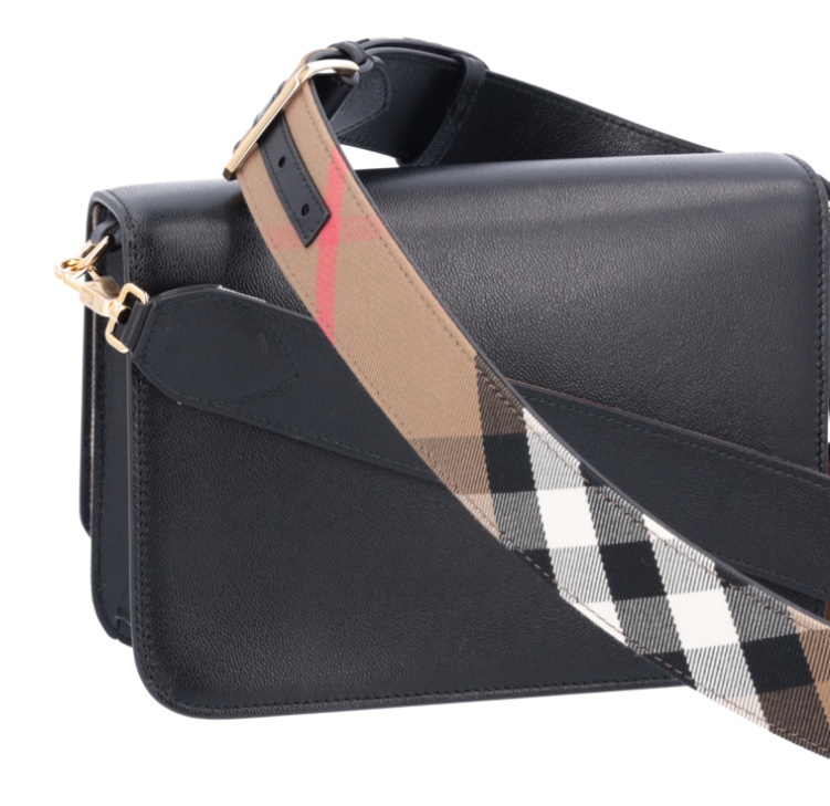 Shop Burberry Plaid Flip Shoulder Bag In Black