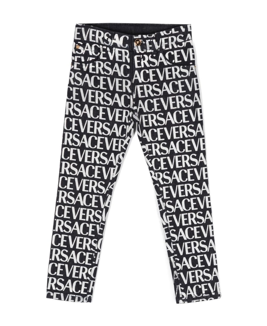 Versace Metallic Logo Print Jeans In Black
