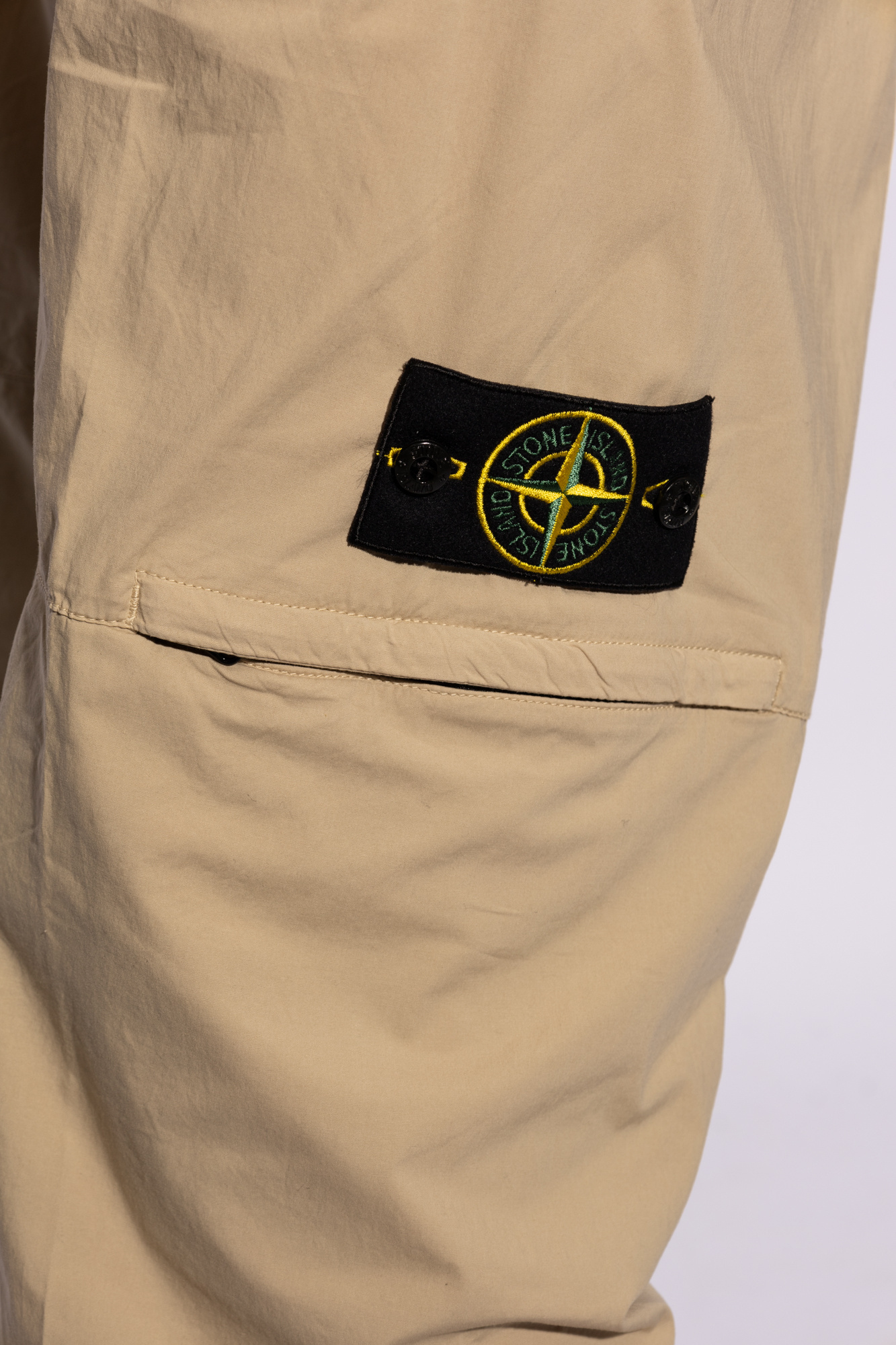 Stone Island Compass-badge Tapered Trousers In Nude