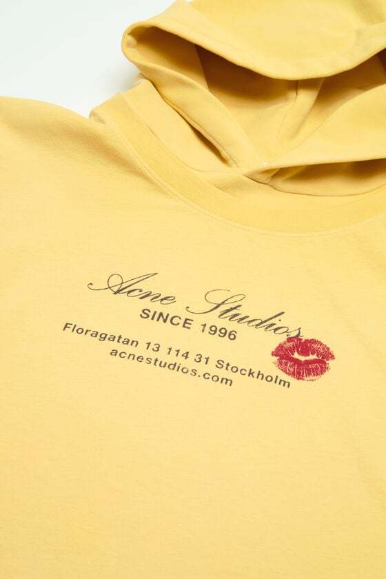 Acne Studios Logo Print Hoodie In Yellow