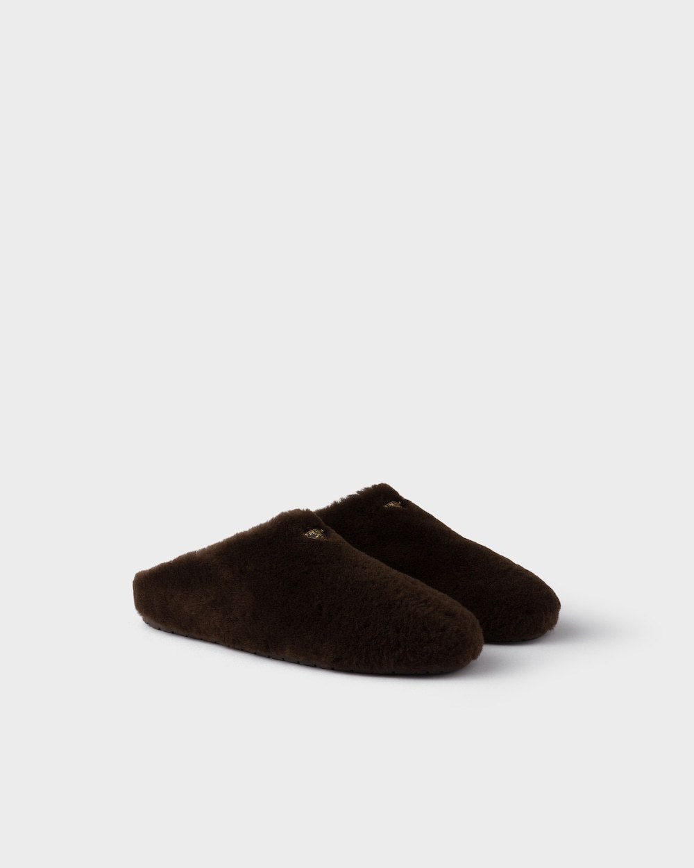 Prada Shearling Mules In Brown