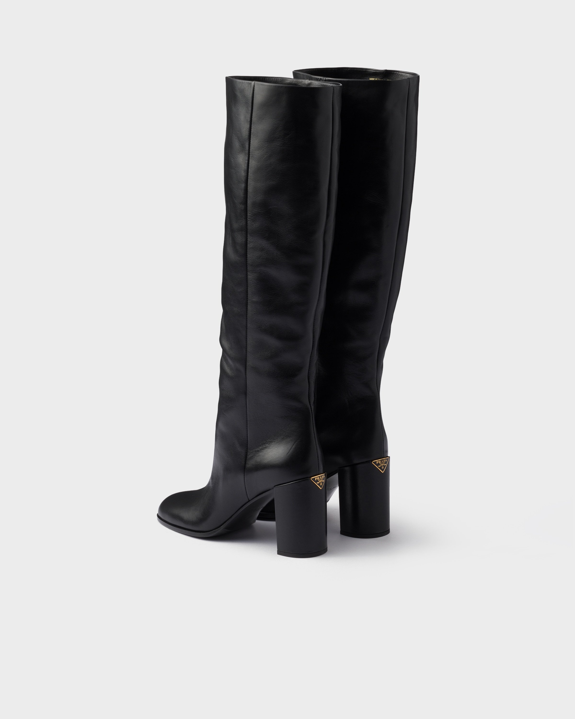 Prada Heeled Leather Boots In Black