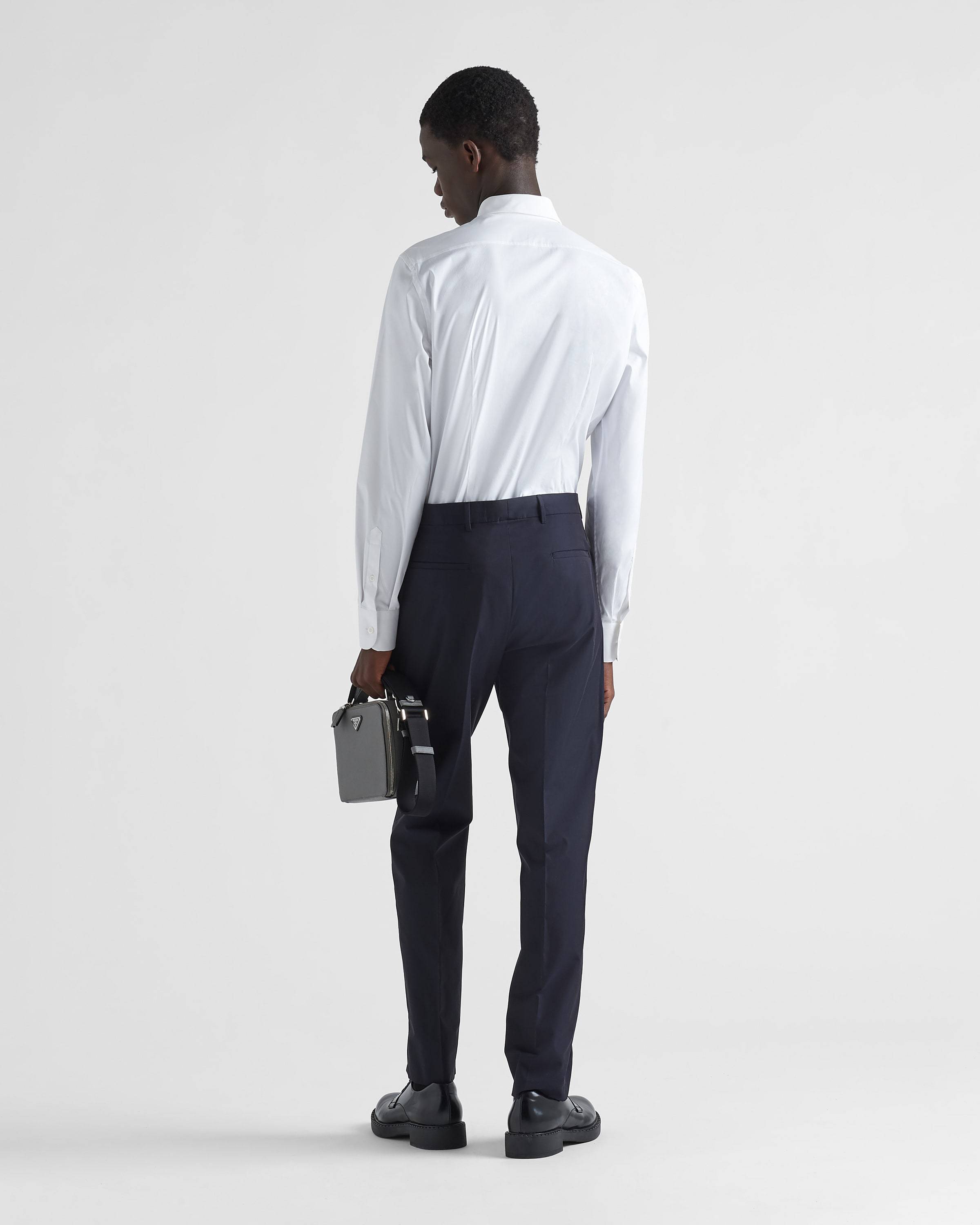 Prada Sling-inserted Bag Casual Trousers In Blue