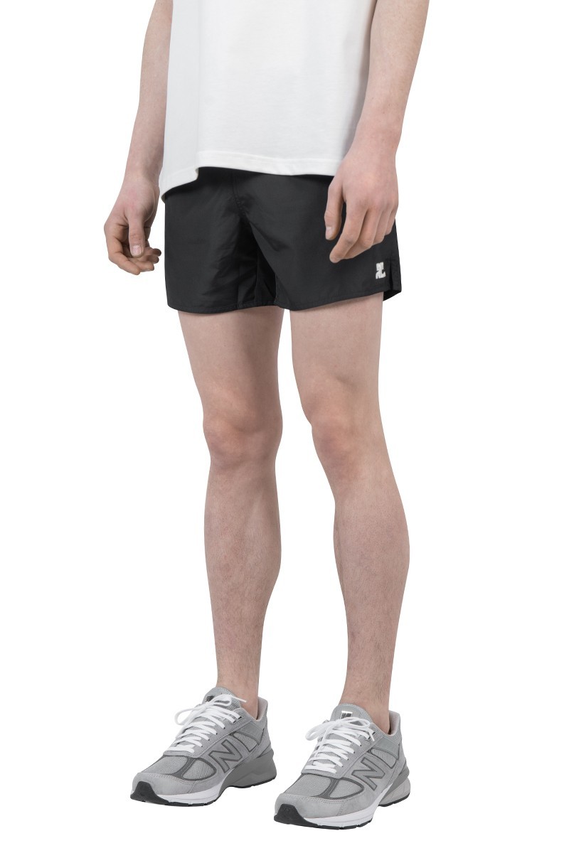 Courrèges Logo-patch Plain Swim Shorts In Black
