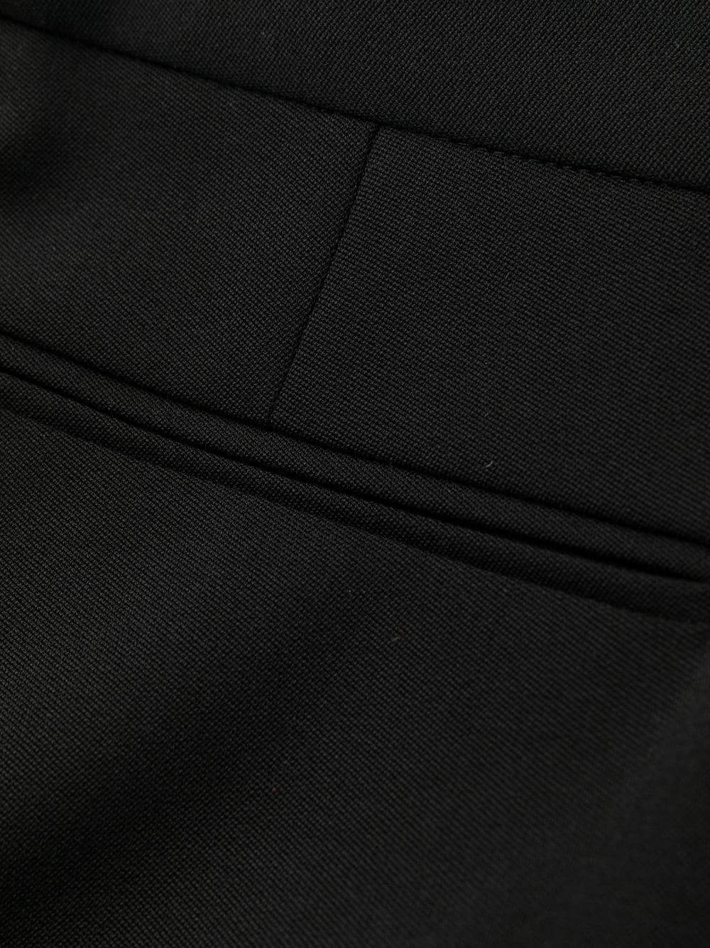Versace Black Flared Tailored Low Waisted Pants In Stretch Wool Woman