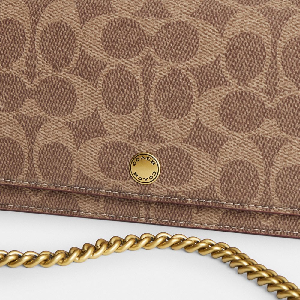 Shop Coach Essential Long Wallet On A Chain In Signature Canvas In Brown