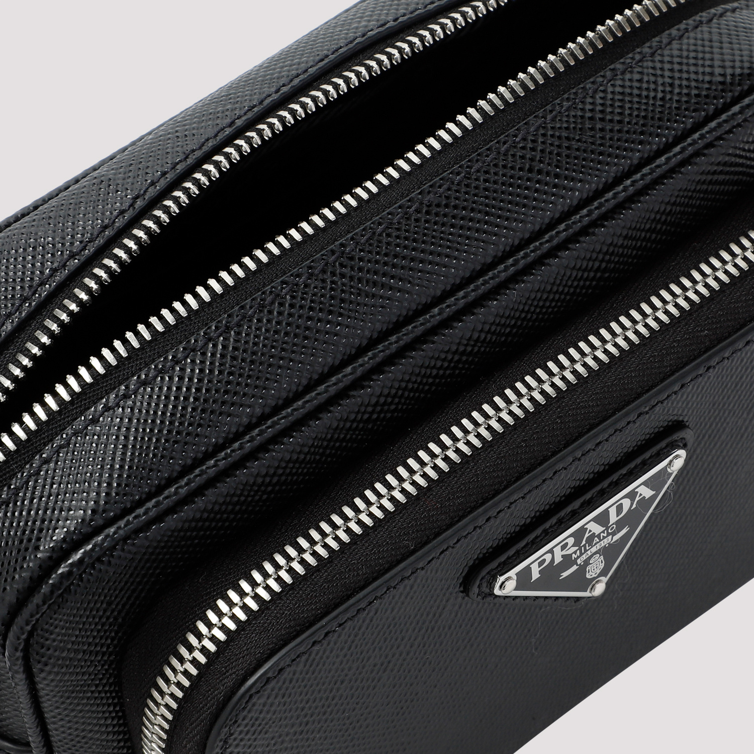 Prada Enamel-logo Messenger Bag In Black