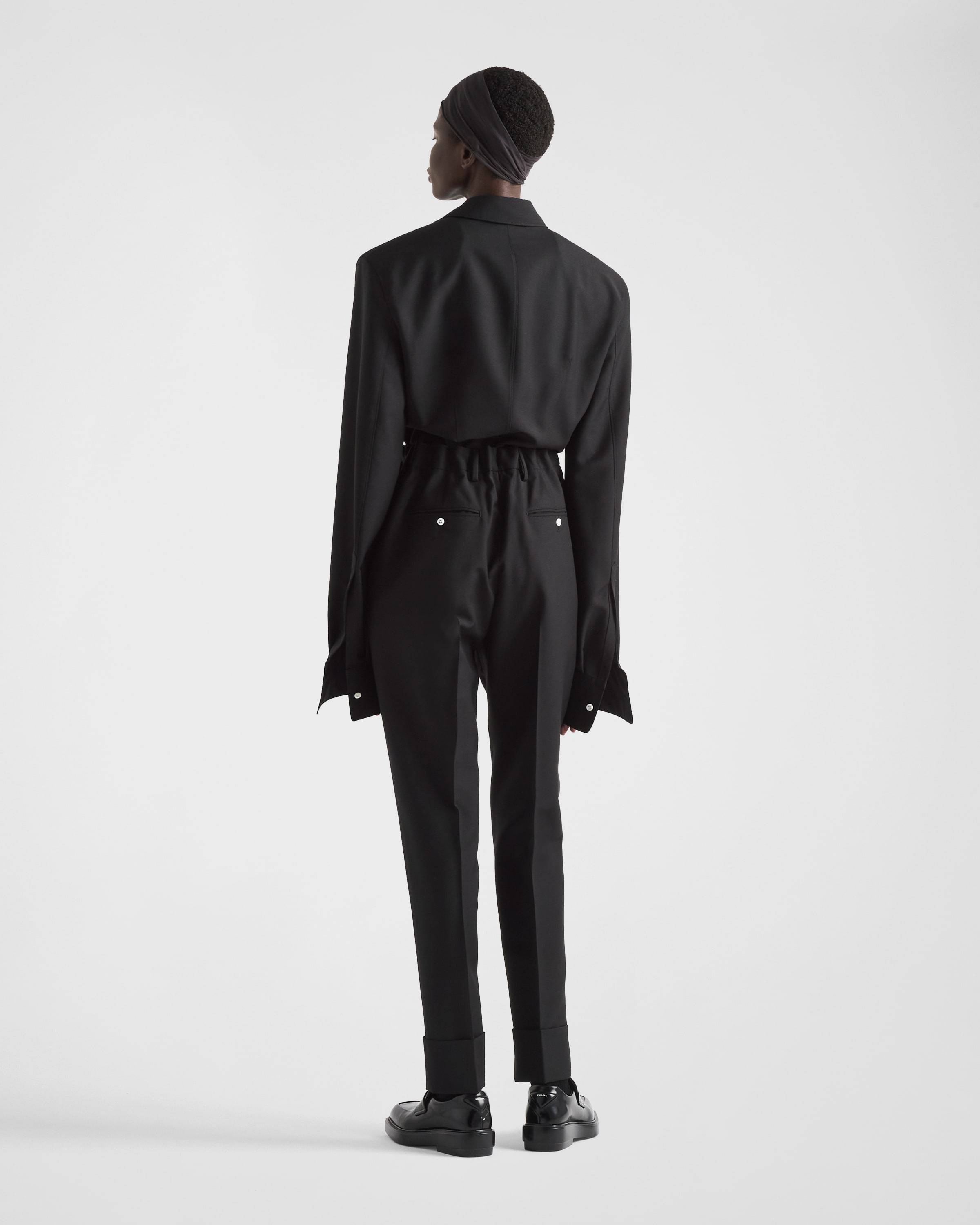 Prada Flared Wool Blend Pants In Black