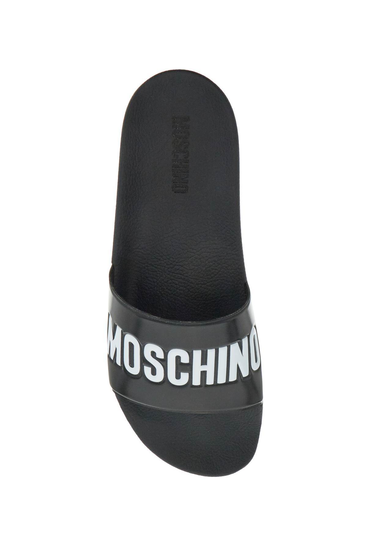 Shop Moschino Brand Logo Slippers In Black
