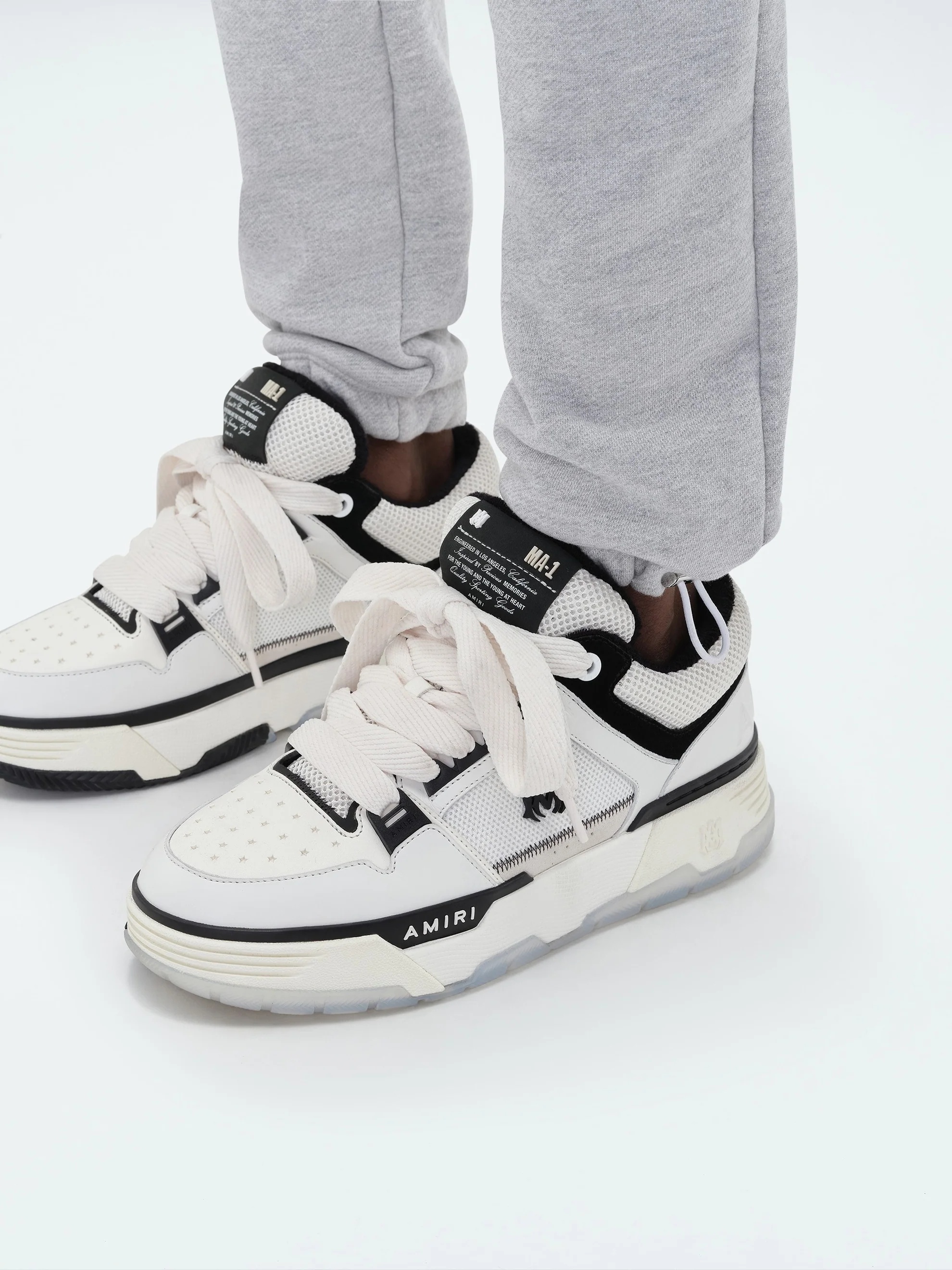 Amiri Logo Embroidered Sweatpants In Gray