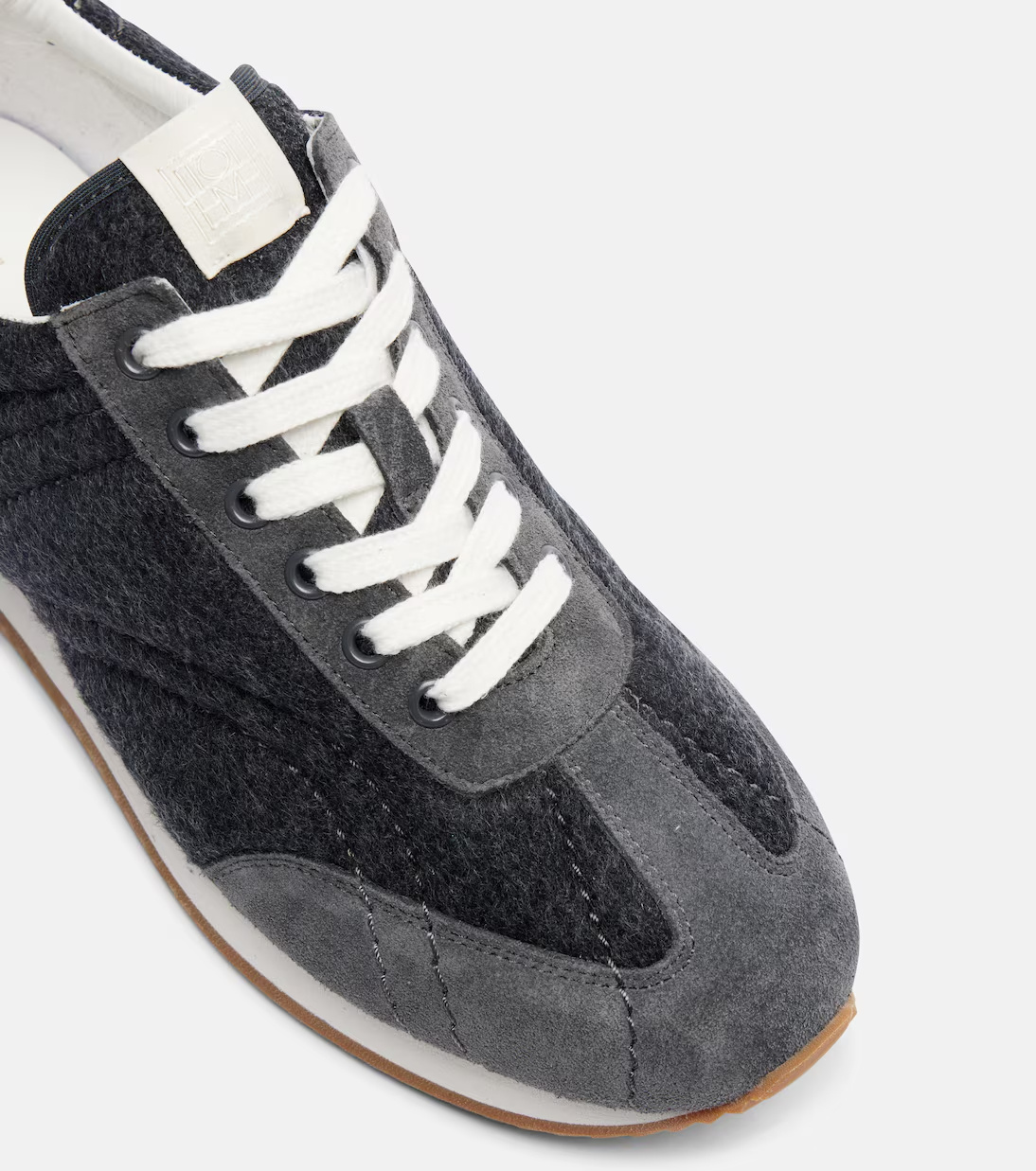 Totême Round-toe Low-top Sneakers In Black