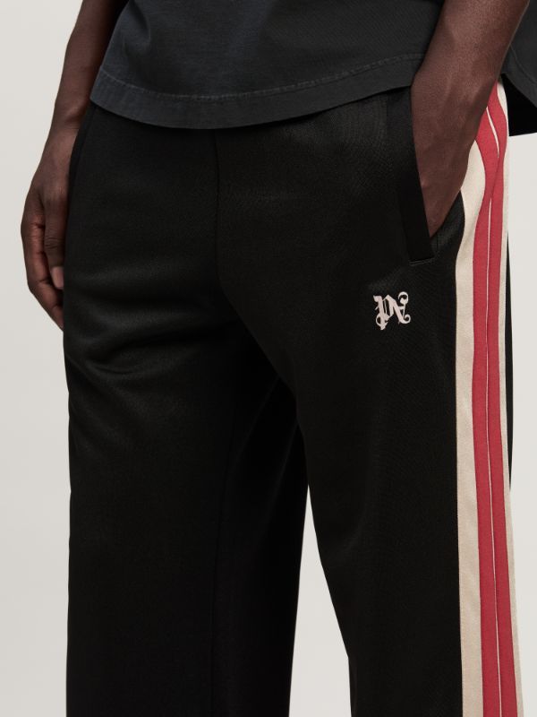 Palm Angels Monogram Embroidered Side Stripe Detailed Track Pants In Black