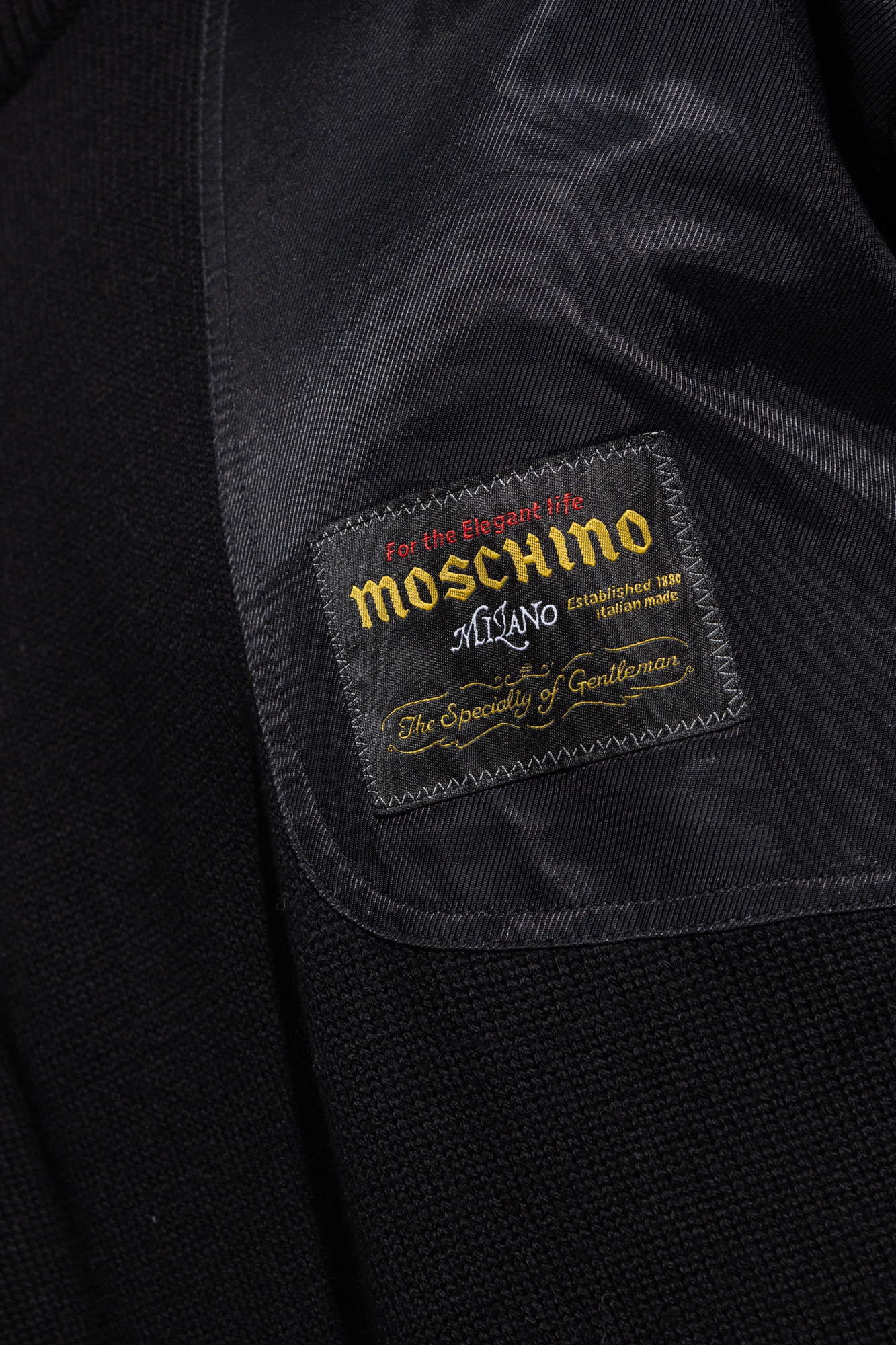 Moschino Long-sleeved Sweater In Black