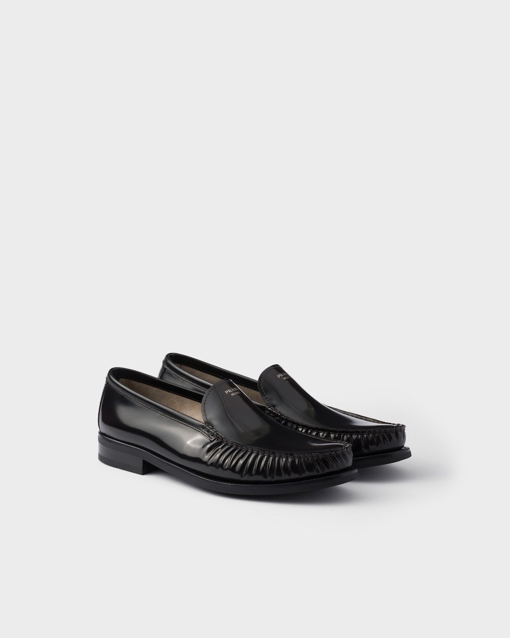 Prada Polished Leather Flat Shoes In Black